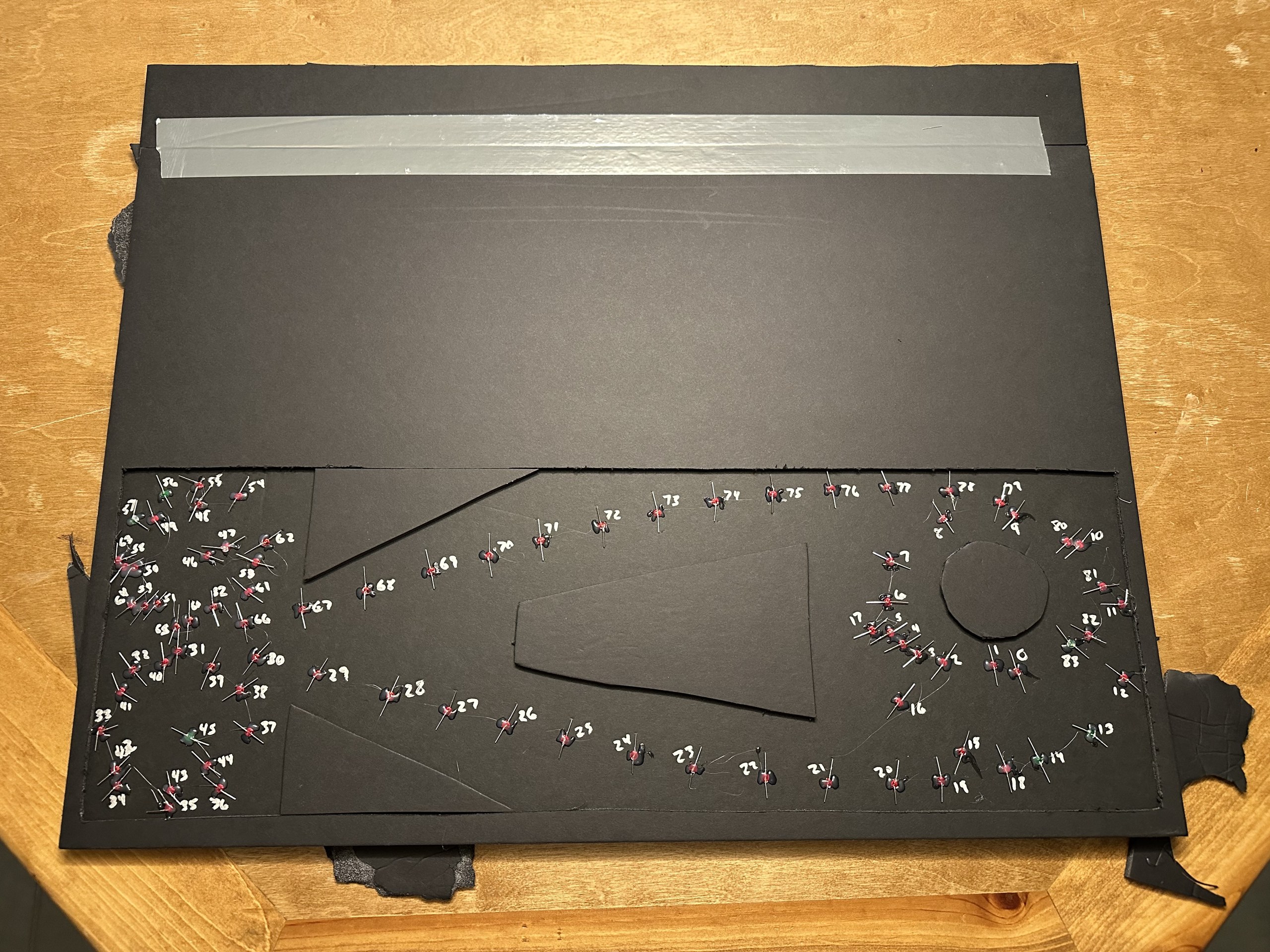 Back of the Mission Map with LEDs hot glued in place and numbered