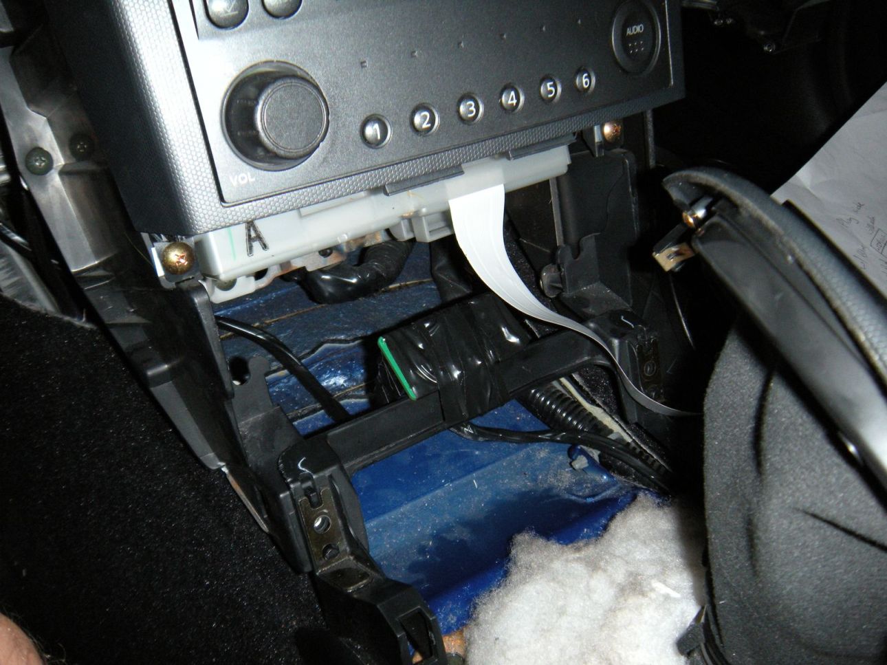 Relay module installed behind the 350Z center console